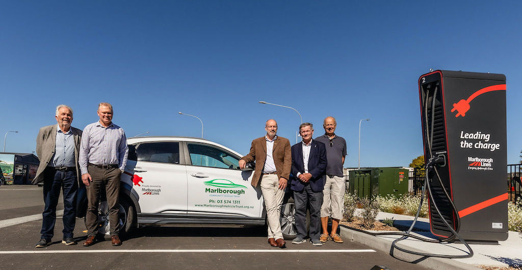 Five men stand in front of a new Kona Electric vehicle that Marlborough lines has sponsored the Trust.